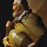Hurdy_Gurdy_Player_with_a_Ribbon_ABC