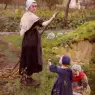 Jameson_Middleton_A_Mother_With_Her_Daughters_In_The_Kitchen_Garden